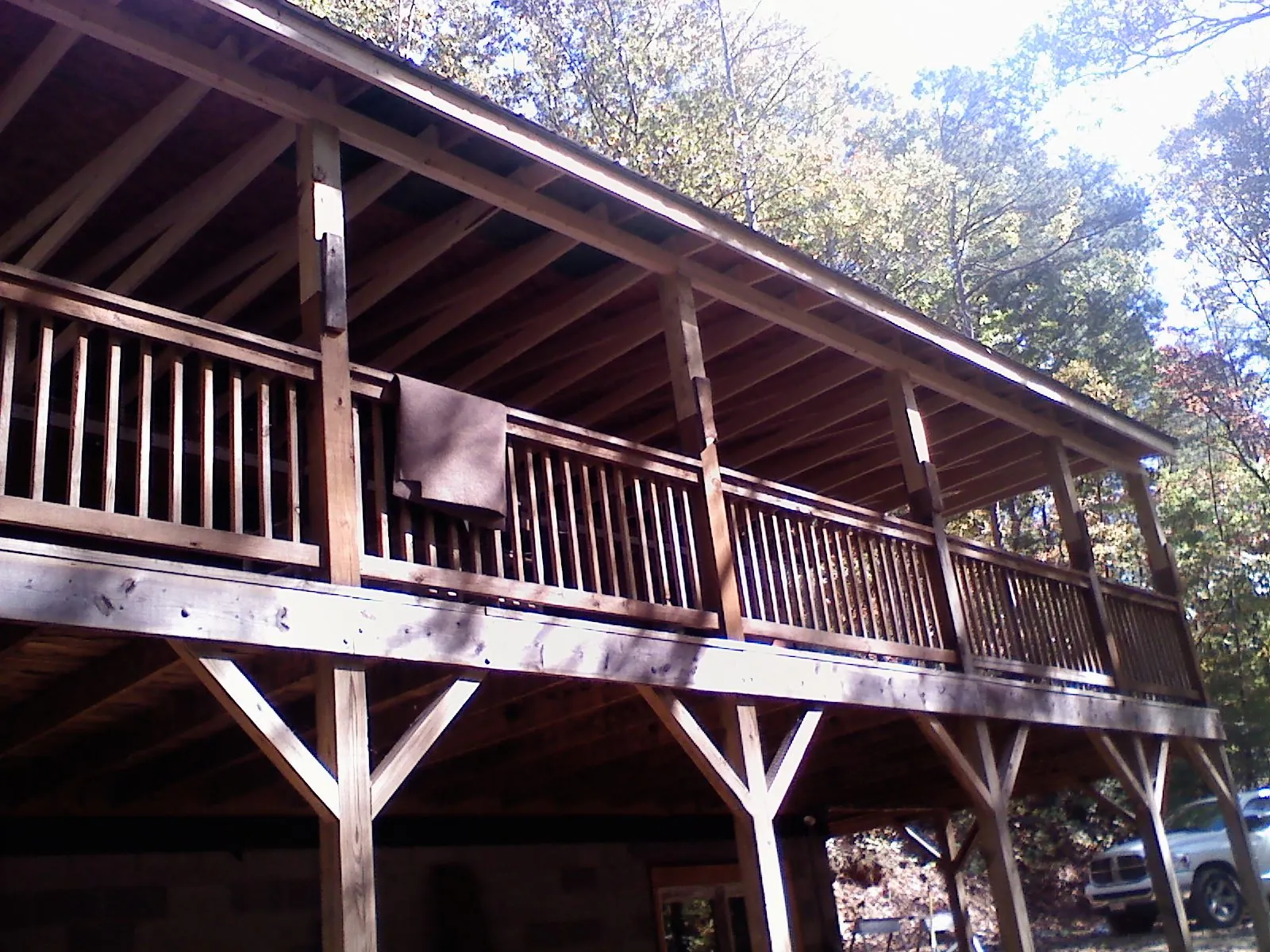 Timber framing under a new elevated porch and deck — Roof Leak Repair in Oakmont by Roofing Brothers